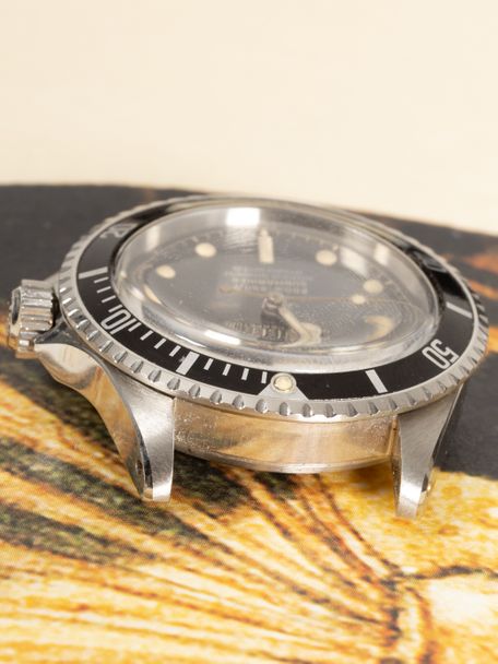 Rolex SOLD-Rolex Submariner 5512 from 1962 with a gilt four liner chapter ring dial and exclamation point
