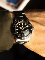 Rolex SOLD-Rolex Submariner 5512 from 1962 with a gilt four liner chapter ring dial and exclamation point