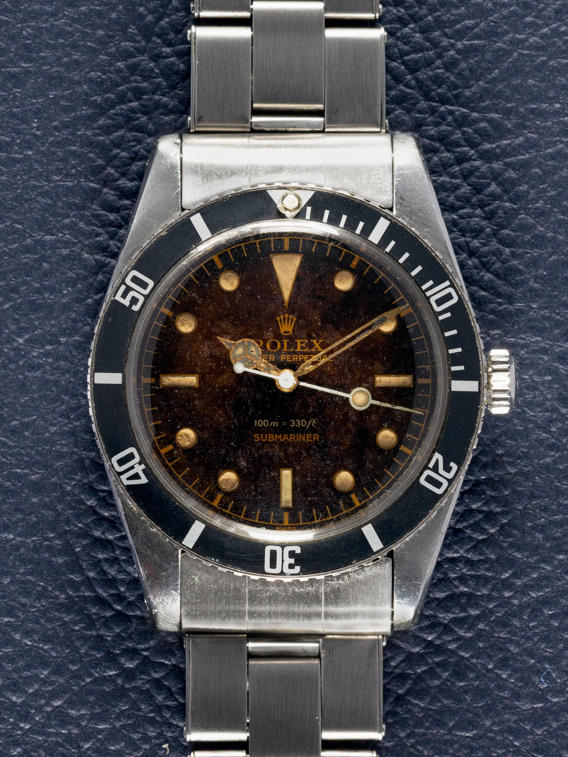 Rolex Submariner reference 6536 1 from 1957 with a gilt dial thin