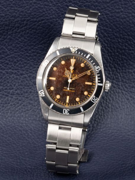 Rolex SOLD-Rolex Submariner reference 6536-1 from 1957 with a gilt dial